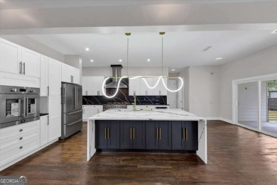 Step into flawless modern luxury at this brand-new custom-built on East Lake Golf Club in Georgia - for sale on GolfHomes.com, golf home, golf lot