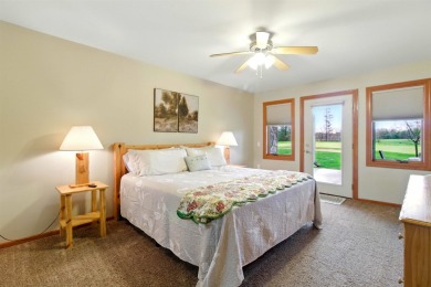 Pride of ownership is evident in this meticulously maintained on Northern Bay Golf Resort and Marina in Wisconsin - for sale on GolfHomes.com, golf home, golf lot