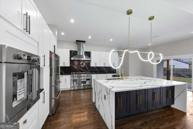 Step into flawless modern luxury at this brand-new custom-built on East Lake Golf Club in Georgia - for sale on GolfHomes.com, golf home, golf lot