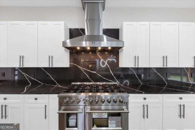 Step into flawless modern luxury at this brand-new custom-built on East Lake Golf Club in Georgia - for sale on GolfHomes.com, golf home, golf lot