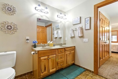 Pride of ownership is evident in this meticulously maintained on Northern Bay Golf Resort and Marina in Wisconsin - for sale on GolfHomes.com, golf home, golf lot
