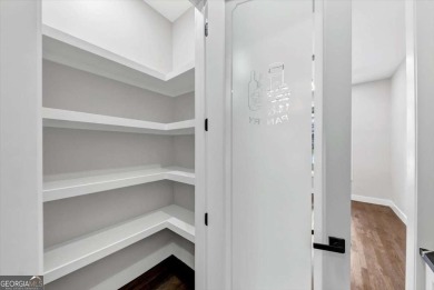 Step into flawless modern luxury at this brand-new custom-built on East Lake Golf Club in Georgia - for sale on GolfHomes.com, golf home, golf lot