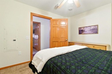 Pride of ownership is evident in this meticulously maintained on Northern Bay Golf Resort and Marina in Wisconsin - for sale on GolfHomes.com, golf home, golf lot