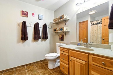 Pride of ownership is evident in this meticulously maintained on Northern Bay Golf Resort and Marina in Wisconsin - for sale on GolfHomes.com, golf home, golf lot