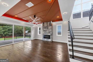 Step into flawless modern luxury at this brand-new custom-built on East Lake Golf Club in Georgia - for sale on GolfHomes.com, golf home, golf lot