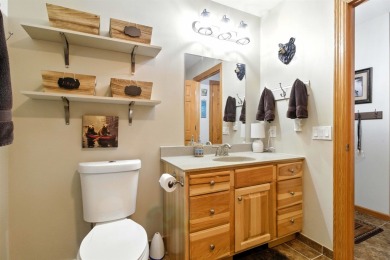 Pride of ownership is evident in this meticulously maintained on Northern Bay Golf Resort and Marina in Wisconsin - for sale on GolfHomes.com, golf home, golf lot
