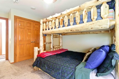 Pride of ownership is evident in this meticulously maintained on Northern Bay Golf Resort and Marina in Wisconsin - for sale on GolfHomes.com, golf home, golf lot