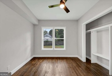Step into flawless modern luxury at this brand-new custom-built on East Lake Golf Club in Georgia - for sale on GolfHomes.com, golf home, golf lot