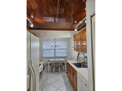 Spectacular 3rd floor unit, diamond design tile flooring in on Colony West Country Club in Florida - for sale on GolfHomes.com, golf home, golf lot