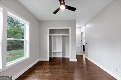 Step into flawless modern luxury at this brand-new custom-built on East Lake Golf Club in Georgia - for sale on GolfHomes.com, golf home, golf lot