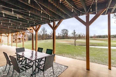 Pride of ownership is evident in this meticulously maintained on Northern Bay Golf Resort and Marina in Wisconsin - for sale on GolfHomes.com, golf home, golf lot