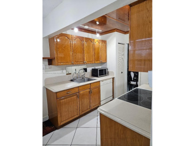 Spectacular 3rd floor unit, diamond design tile flooring in on Colony West Country Club in Florida - for sale on GolfHomes.com, golf home, golf lot