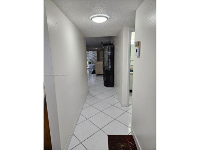Spectacular 3rd floor unit, diamond design tile flooring in on Colony West Country Club in Florida - for sale on GolfHomes.com, golf home, golf lot