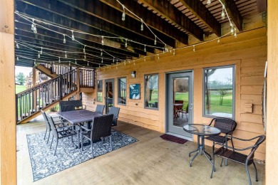 Pride of ownership is evident in this meticulously maintained on Northern Bay Golf Resort and Marina in Wisconsin - for sale on GolfHomes.com, golf home, golf lot