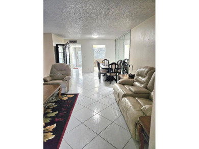 Spectacular 3rd floor unit, diamond design tile flooring in on Colony West Country Club in Florida - for sale on GolfHomes.com, golf home, golf lot