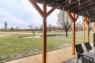 Pride of ownership is evident in this meticulously maintained on Northern Bay Golf Resort and Marina in Wisconsin - for sale on GolfHomes.com, golf home, golf lot