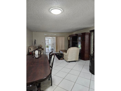 Spectacular 3rd floor unit, diamond design tile flooring in on Colony West Country Club in Florida - for sale on GolfHomes.com, golf home, golf lot