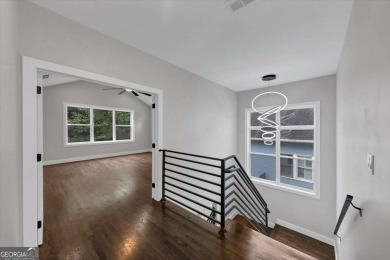 Step into flawless modern luxury at this brand-new custom-built on East Lake Golf Club in Georgia - for sale on GolfHomes.com, golf home, golf lot