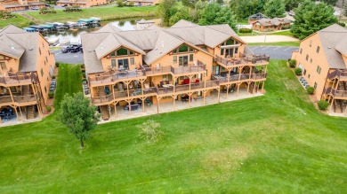 Pride of ownership is evident in this meticulously maintained on Northern Bay Golf Resort and Marina in Wisconsin - for sale on GolfHomes.com, golf home, golf lot