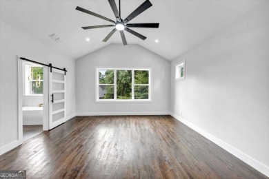 Step into flawless modern luxury at this brand-new custom-built on East Lake Golf Club in Georgia - for sale on GolfHomes.com, golf home, golf lot