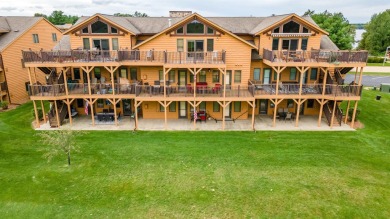 Pride of ownership is evident in this meticulously maintained on Northern Bay Golf Resort and Marina in Wisconsin - for sale on GolfHomes.com, golf home, golf lot