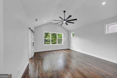 Step into flawless modern luxury at this brand-new custom-built on East Lake Golf Club in Georgia - for sale on GolfHomes.com, golf home, golf lot