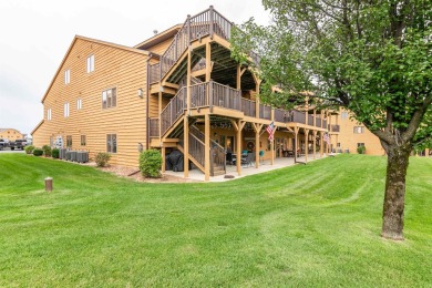 Pride of ownership is evident in this meticulously maintained on Northern Bay Golf Resort and Marina in Wisconsin - for sale on GolfHomes.com, golf home, golf lot