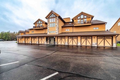 Pride of ownership is evident in this meticulously maintained on Northern Bay Golf Resort and Marina in Wisconsin - for sale on GolfHomes.com, golf home, golf lot