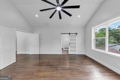 Step into flawless modern luxury at this brand-new custom-built on East Lake Golf Club in Georgia - for sale on GolfHomes.com, golf home, golf lot