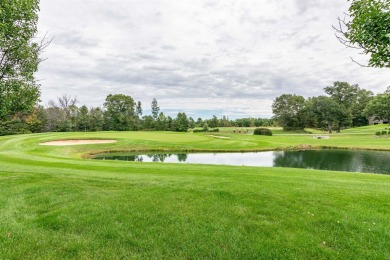 Pride of ownership is evident in this meticulously maintained on Northern Bay Golf Resort and Marina in Wisconsin - for sale on GolfHomes.com, golf home, golf lot