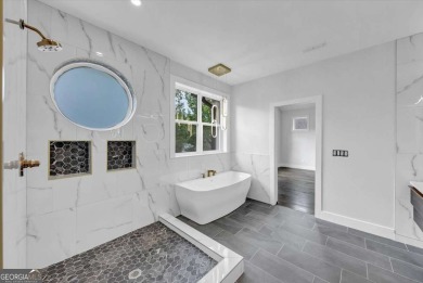 Step into flawless modern luxury at this brand-new custom-built on East Lake Golf Club in Georgia - for sale on GolfHomes.com, golf home, golf lot
