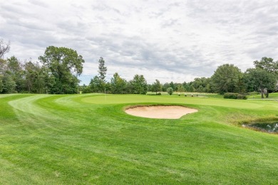 Pride of ownership is evident in this meticulously maintained on Northern Bay Golf Resort and Marina in Wisconsin - for sale on GolfHomes.com, golf home, golf lot