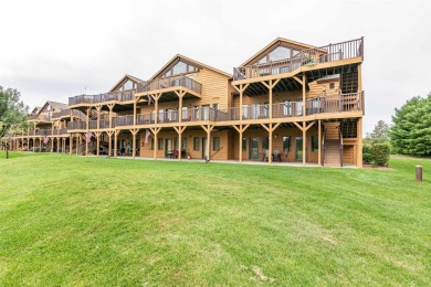 Pride of ownership is evident in this meticulously maintained on Northern Bay Golf Resort and Marina in Wisconsin - for sale on GolfHomes.com, golf home, golf lot
