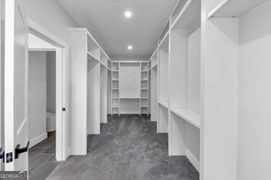 Step into flawless modern luxury at this brand-new custom-built on East Lake Golf Club in Georgia - for sale on GolfHomes.com, golf home, golf lot