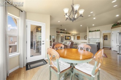 This stunning home offers four bedrooms and three bathrooms with on The Club At Flying Horse in Colorado - for sale on GolfHomes.com, golf home, golf lot