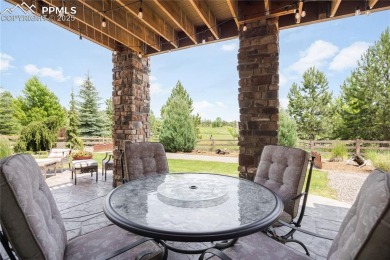 This stunning home offers four bedrooms and three bathrooms with on The Club At Flying Horse in Colorado - for sale on GolfHomes.com, golf home, golf lot