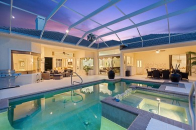 This exquisite four-bedroom home is majestically situated on the on University Park Country Club in Florida - for sale on GolfHomes.com, golf home, golf lot