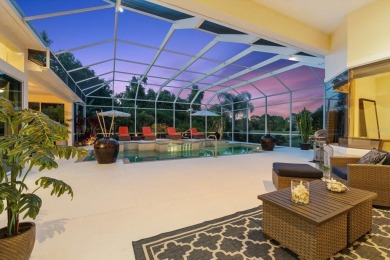 This exquisite four-bedroom home is majestically situated on the on University Park Country Club in Florida - for sale on GolfHomes.com, golf home, golf lot