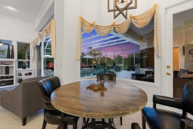 This exquisite four-bedroom home is majestically situated on the on University Park Country Club in Florida - for sale on GolfHomes.com, golf home, golf lot