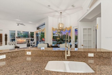 This exquisite four-bedroom home is majestically situated on the on University Park Country Club in Florida - for sale on GolfHomes.com, golf home, golf lot