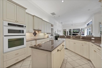 This exquisite four-bedroom home is majestically situated on the on University Park Country Club in Florida - for sale on GolfHomes.com, golf home, golf lot