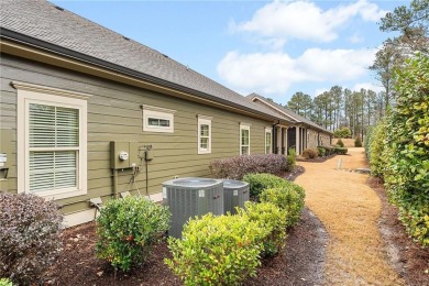 Looks can be deceiving--this immaculate townhome is far more on Bentwater Golf Club in Georgia - for sale on GolfHomes.com, golf home, golf lot