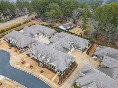 Looks can be deceiving--this immaculate townhome is far more on Bentwater Golf Club in Georgia - for sale on GolfHomes.com, golf home, golf lot