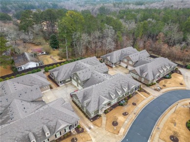 Looks can be deceiving--this immaculate townhome is far more on Bentwater Golf Club in Georgia - for sale on GolfHomes.com, golf home, golf lot