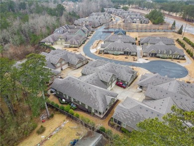 Looks can be deceiving--this immaculate townhome is far more on Bentwater Golf Club in Georgia - for sale on GolfHomes.com, golf home, golf lot