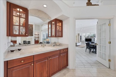 This exquisite four-bedroom home is majestically situated on the on University Park Country Club in Florida - for sale on GolfHomes.com, golf home, golf lot