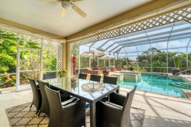 This exquisite four-bedroom home is majestically situated on the on University Park Country Club in Florida - for sale on GolfHomes.com, golf home, golf lot