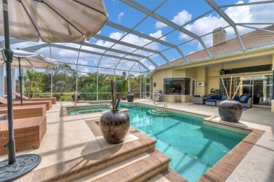 This exquisite four-bedroom home is majestically situated on the on University Park Country Club in Florida - for sale on GolfHomes.com, golf home, golf lot