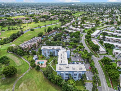 Welcome to a stunning corner Unit 2 bedrooms and 2 bathrooms on Oriole Golf and Tennis Club in Florida - for sale on GolfHomes.com, golf home, golf lot