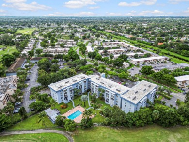 Welcome to a stunning corner Unit 2 bedrooms and 2 bathrooms on Oriole Golf and Tennis Club in Florida - for sale on GolfHomes.com, golf home, golf lot